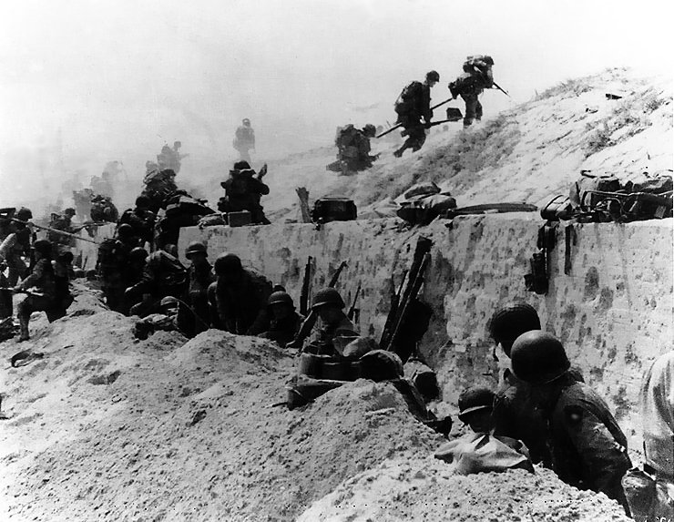 Utah beach men going over wall